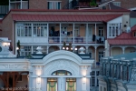 Georgian architecture in Tbilisi city center with house facade and balcon in the evening