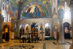 orthodox church interior in Tbilisi,Georgia:altar,crosses,columns and icons